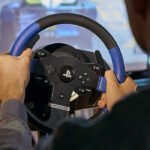 Thrustmaster T150 Force Feedback Racing Wheel With 13 Actions Buttons & D-Pad, Two Wheel-Mounted Paddle Shifters, Large-Optimized Pedal Set, Compatible with PS3, PS4, PS5 & PC - Black/Blue - Image 2